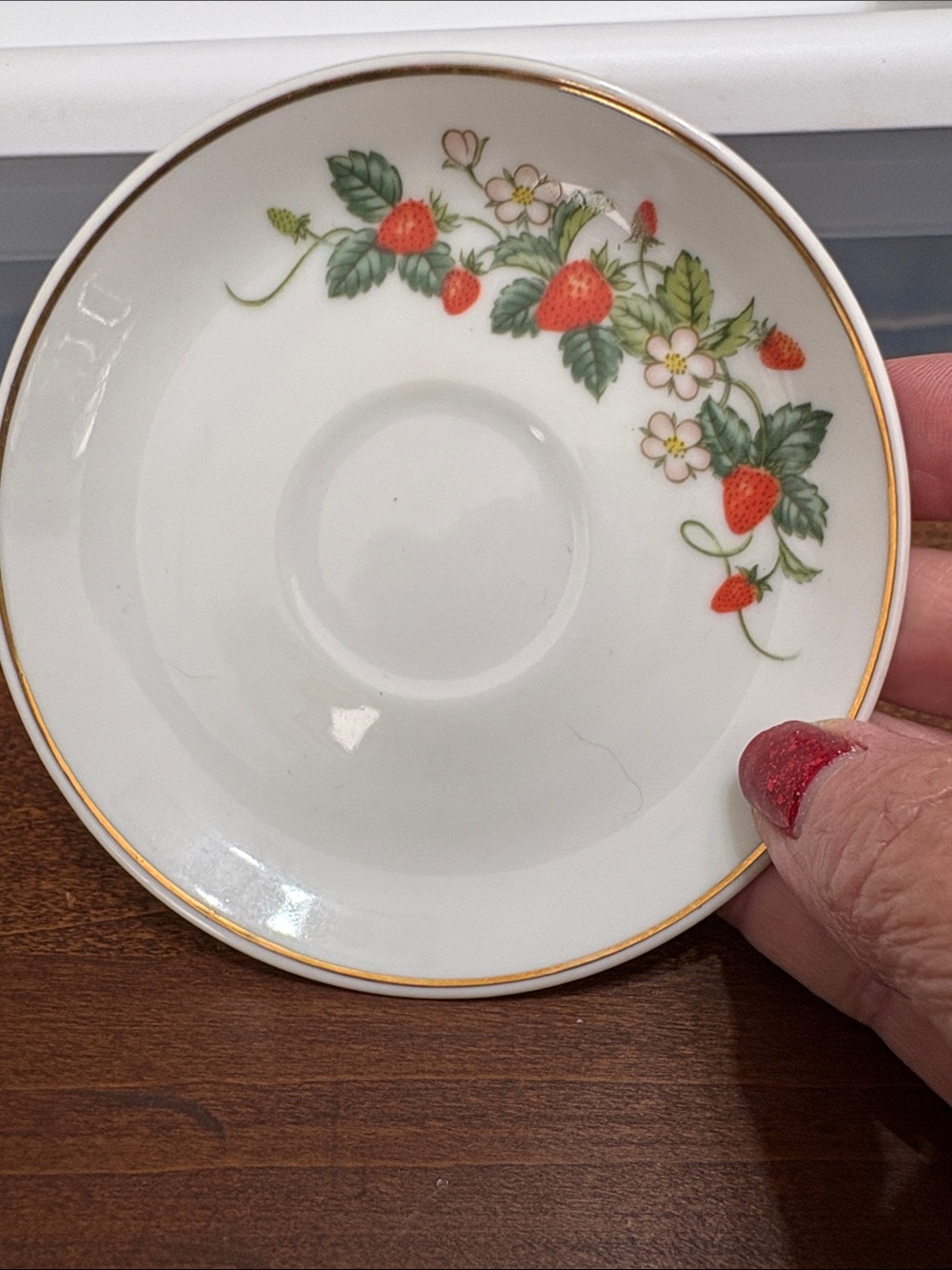 Avon Strawberry Porcelain Saucers set of 4.